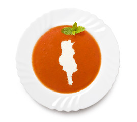 Plate tomato soup with cream in the shape of Tunisia.(series)