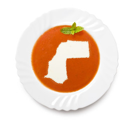 Plate tomato soup with cream in the shape of Western Sahara.(ser