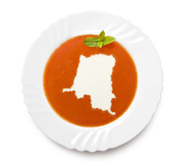 Plate tomato soup with cream in the shape of Zaire.(series)