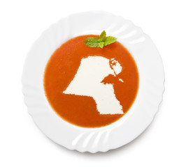 Plate tomato soup with cream in the shape of Kuwait.(series)
