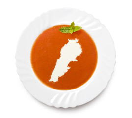 Plate tomato soup with cream in the shape of Lebanon.(series)