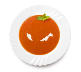 Plate tomato soup with cream in the shape of Malaysia.(series)