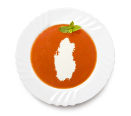 Plate tomato soup with cream in the shape of Qatar.(series)