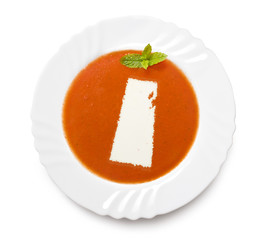 Plate tomato soup with cream in the shape of Saskatchewan.(serie