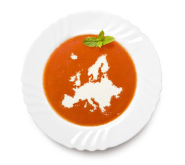 Plate tomato soup with cream in the shape of Europe.(series)