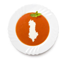 Plate tomato soup with cream in the shape of Albania.(series)