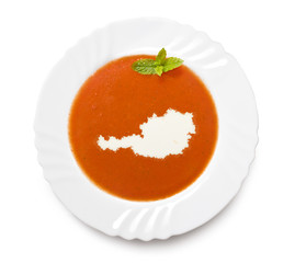 Plate tomato soup with cream in the shape of Austria.(series)
