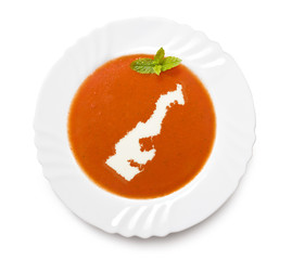 Plate tomato soup with cream in the shape of Monaco.(series)