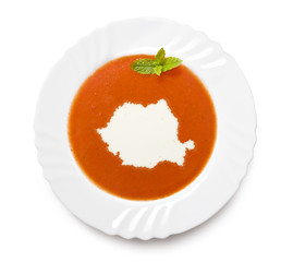 Plate tomato soup with cream in the shape of Romania.(series)