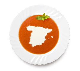 Plate tomato soup with cream in the shape of Spain.(series)