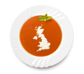 Plate tomato soup with cream in the shape of United Kingdom.(ser