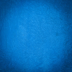 Grain blue paint wall background or texture