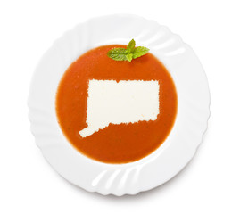 Plate tomato soup with cream in the shape of Connecticut.(series