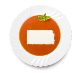 Plate tomato soup with cream in the shape of Kansas.(series)