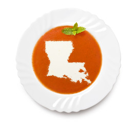 Plate tomato soup with cream in the shape of Louisiana.(series)