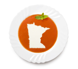 Plate tomato soup with cream in the shape of Minnesota.(series)