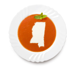 Plate tomato soup with cream in the shape of Mississippi.(series