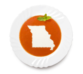 Plate tomato soup with cream in the shape of Missouri.(series)
