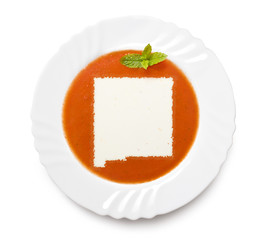 Plate tomato soup with cream in the shape of New Mexico.(series)