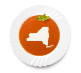 Plate tomato soup with cream in the shape of New York.(series)