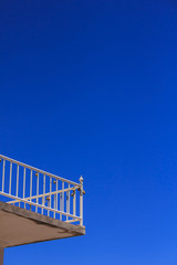 View of the blue sky from a hotel balcony