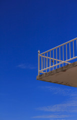 View of the blue sky from a hotel balcony