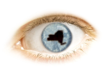 Close-up of an eye with the pupil in the shape of New York.(seri