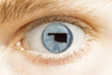 Close-up of an eye with the pupil in the shape of Oklahoma.(seri