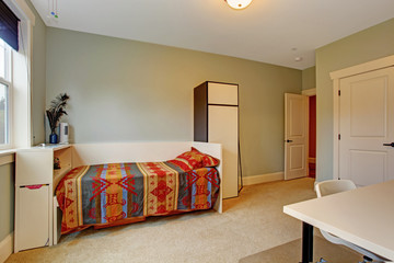 Simple bedroom interior with single bed