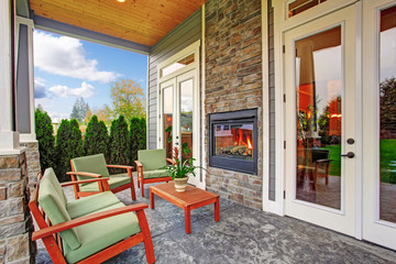 Cozy backyard with fireplace in luxury house