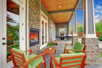 Cozy backyard with fireplace in luxury house