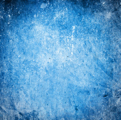 Grunge blue background with stains and scratches