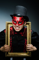 Funny devil with picture frame