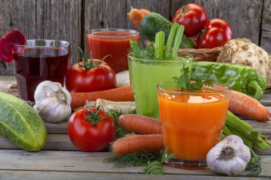 Healthy vegetable juices of carrot, celery, beetroot and tomato