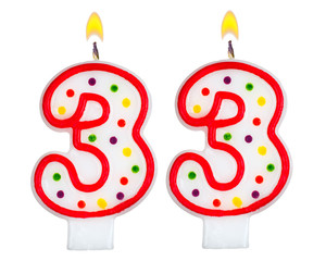 Birthday candles number thirty three isolated on white