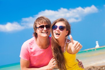 front view of couple having fun at beach