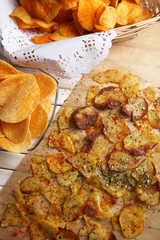 Homemade potato chips on table, close up