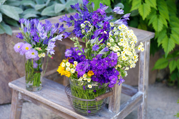 Garden decoration with wildflowers, outdoors