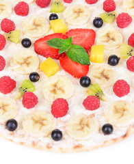Sweet pizza with fruits close-up