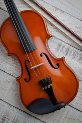 Fototapeta na wymiar Old Classic violin vintage on the wooden background