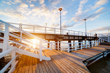 Beautiful retro pier at sunset. Gdansk Brzezno, Poland - obrazy, fototapety, plakaty