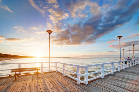 Fototapeta Beautiful retro pier at sunset. Gdansk Brzezno, Poland