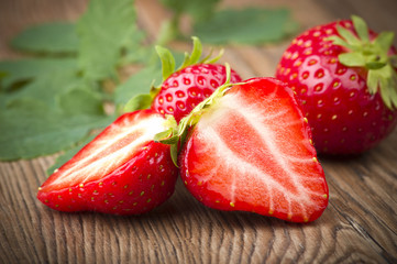 Fresh Strawberry close up on the wood
