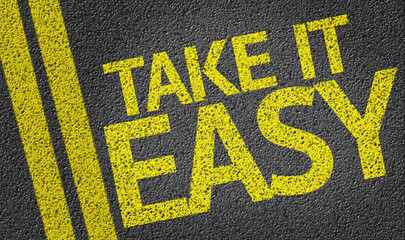 Obraz premium Take It Easy written on the road