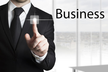 businessman pressing touchscreen business