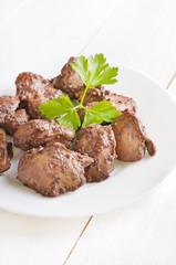 Chicken liver on white plate