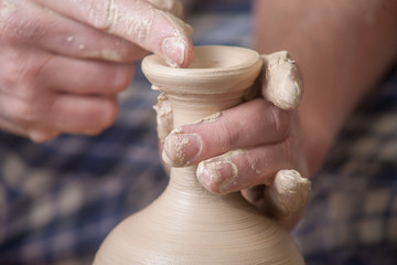 Obraz na płótnie Canvas Hands of a potter