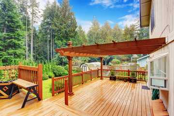 Walkout deck with attached pergola - 67207636