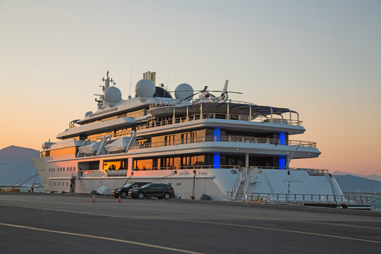 Sunset: Luxury Large Super Or Mega Motor Yacht In The Evening.