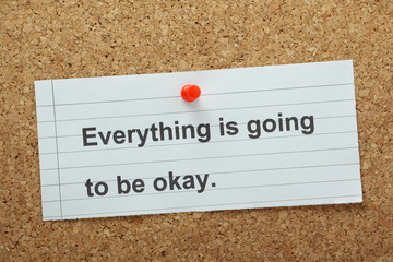 Everything is going to be Okay on a cork notice board